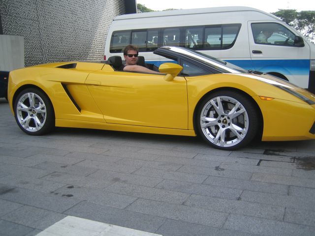 Driving a yellow Lamborghini convertible